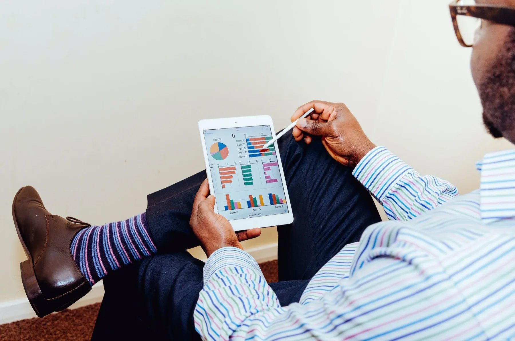 Investor reviewing property performance charts